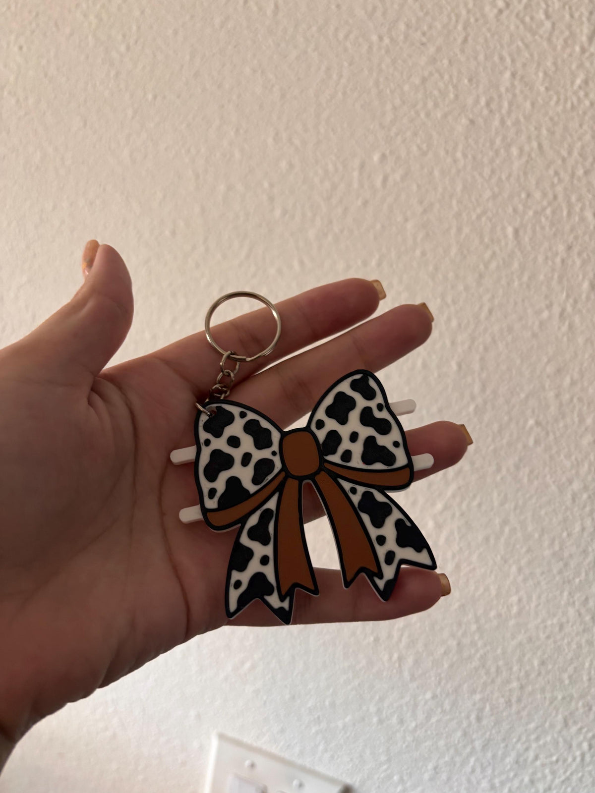 Bow Cowprint Hair Tie Holder Keychain